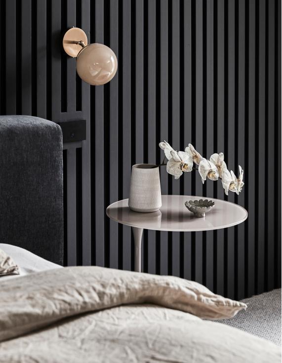 bedroom details with black timber panelling 