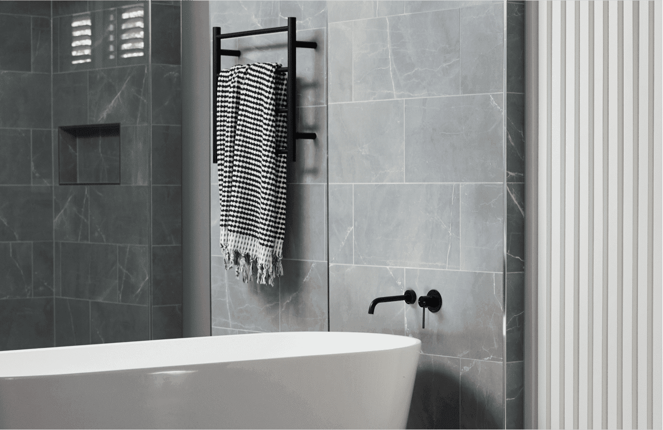 Freestanding bath in sleek, contemporary ensuite