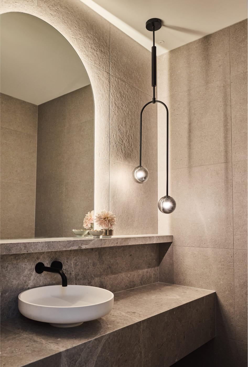 Moody powder room with feature pendant