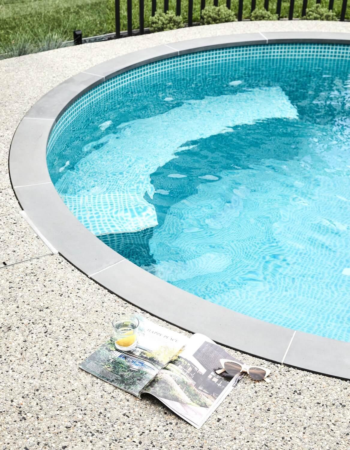 Circular Plunge Pool With Light Tiling