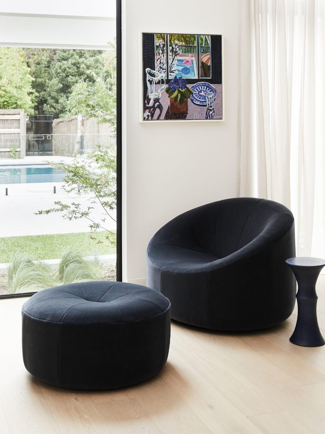 Contemporary Black Chair And Ottoman