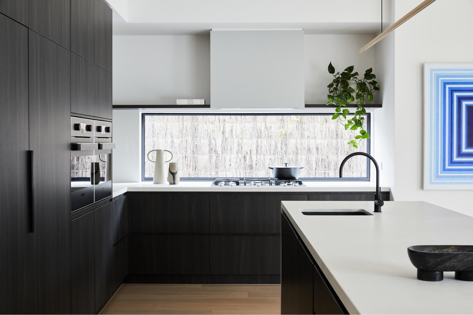 Seamless Cabinetry And Appliance Integration Create Minimalist Aesthetic
