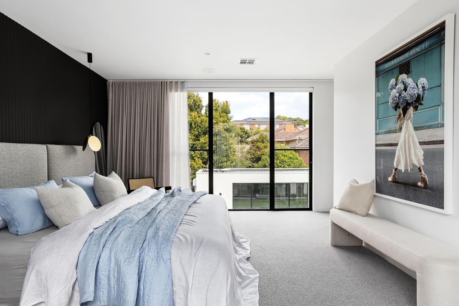 a  modern bedroom with view overlooking the area