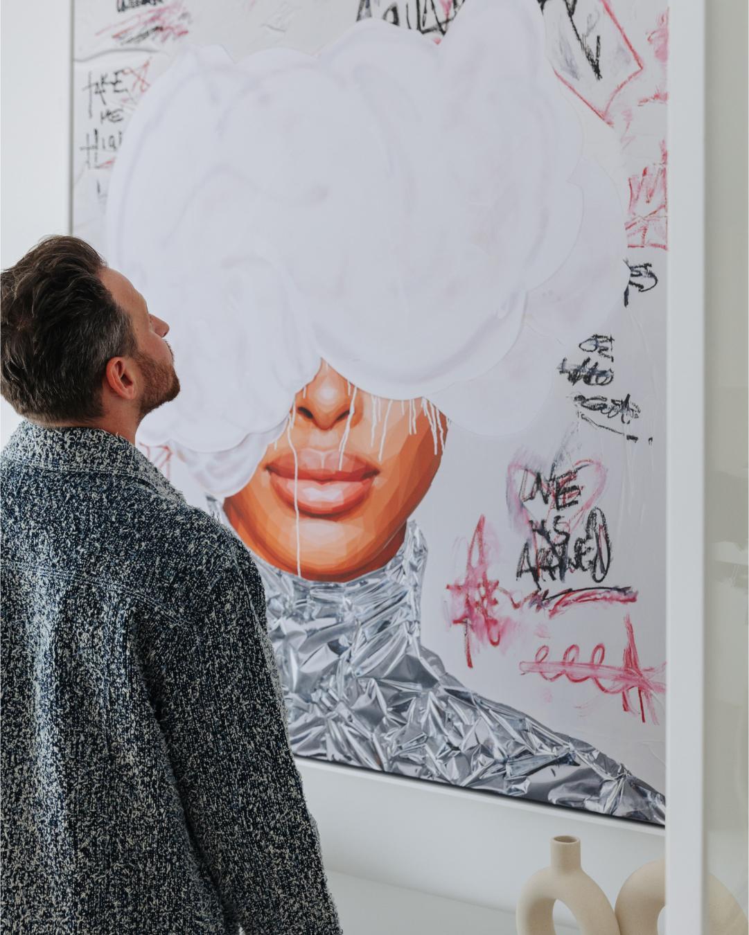 Brent Rosenberg admiring his painting 'taken me' 