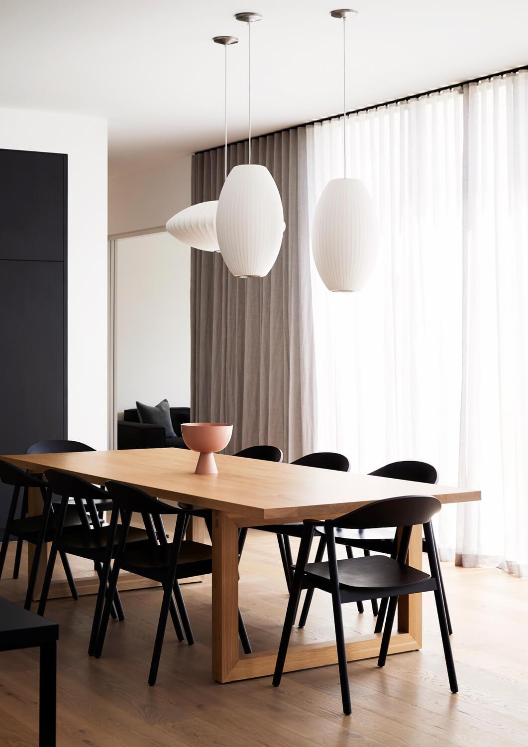 Dining Room With Contemporary Furniture And Pendant Lighting