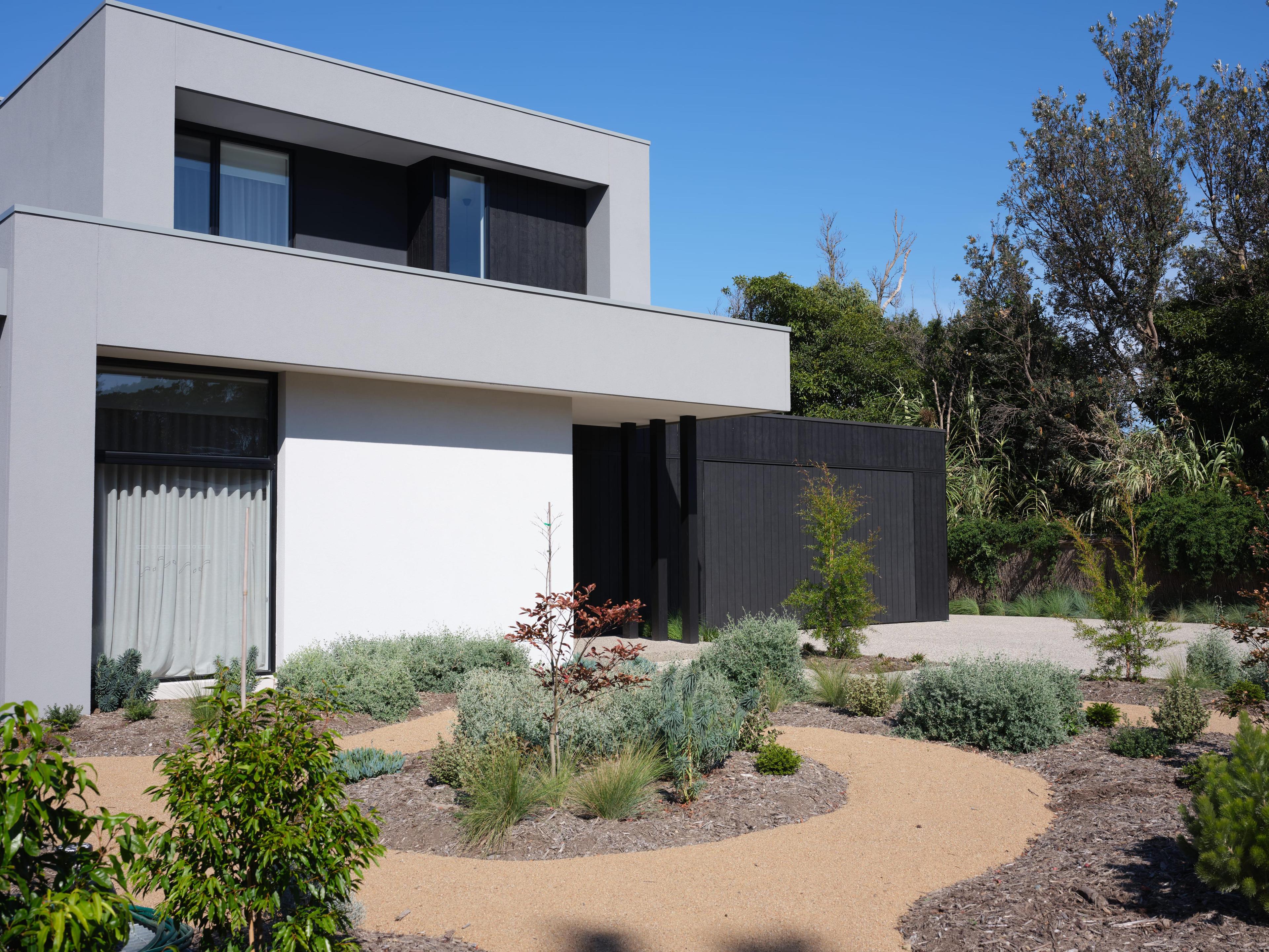 Contemporary house facade with landscaping
