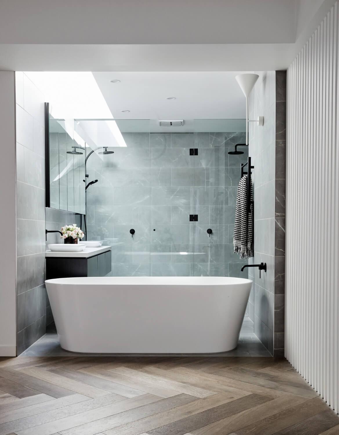 Exposed Ensuite With Floor To Ceiling Porcelain Tiles And Skylight